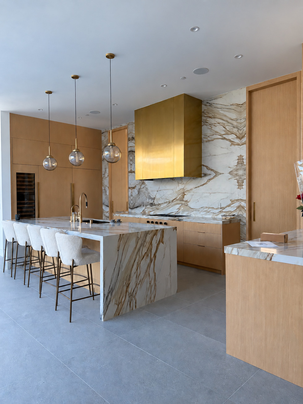 Marble and gold kitchen custome made high end cabinetry